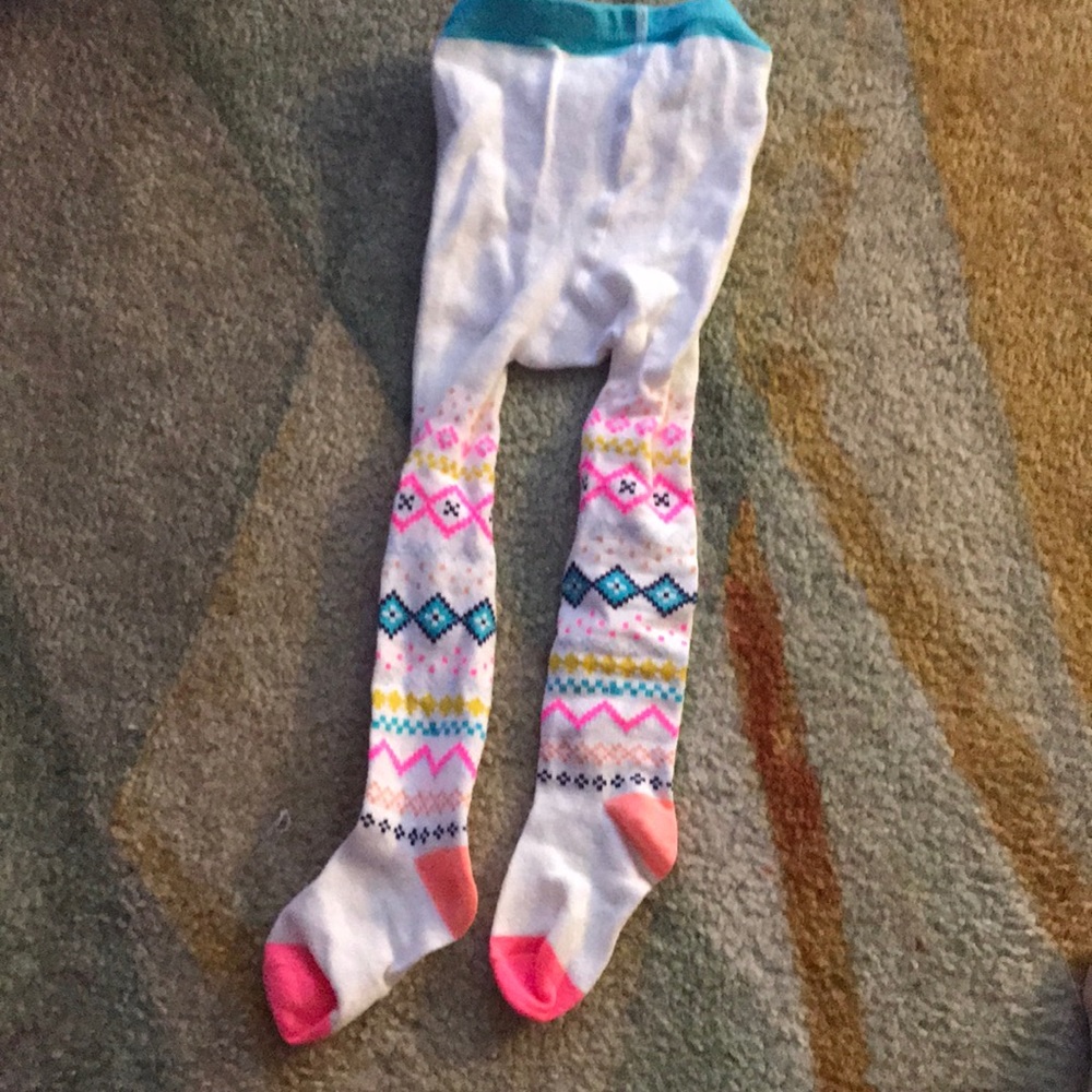 Little girl’s patterned tights